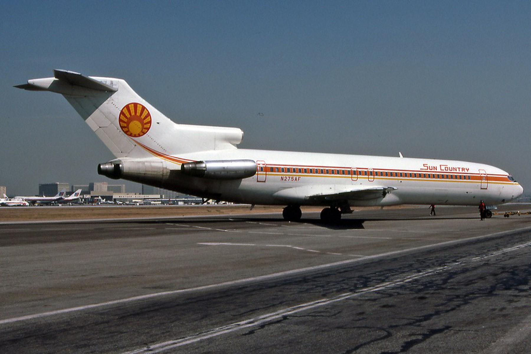 Sun Country Airlines B727-227, N275AF
Seen at LAX International Airport on 10 Dec 1985
Wearing the original Sun Country colors and logo.
Photo Courtesy of Derek Heley