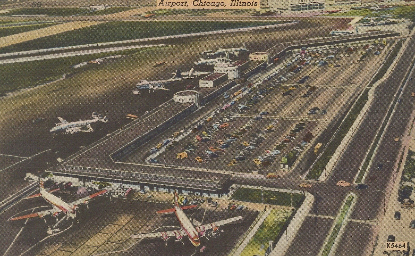 Chicago Midway Airport aerial view showing numerous propliners, 1950s