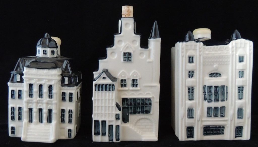 Three Delft blue-style KLM houses
